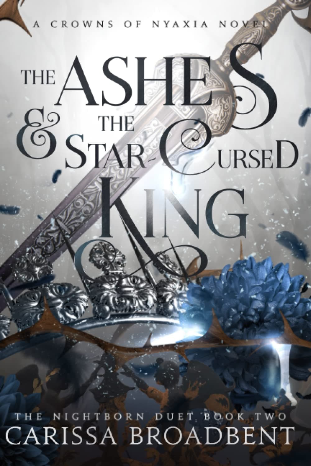The Ashes and the Star-Cursed King (Crowns of Nyaxia) Paperback – April 12, 2023
